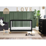 Delta Sloane Convertible Acrylic Crib with Toddler Rail and 4 Drawer Dresser with Changing Tray - Black with Melted Base